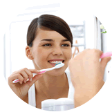 woman cleaning teeth