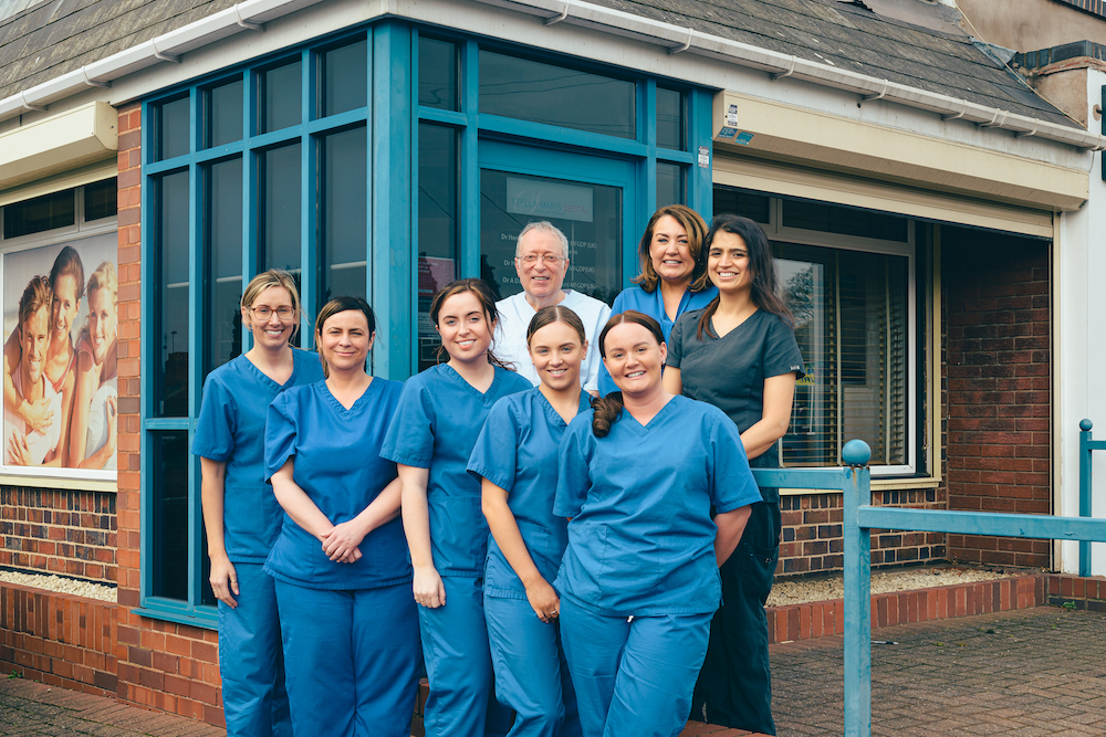 Group photo of the dental team at Stella Maris Dental 